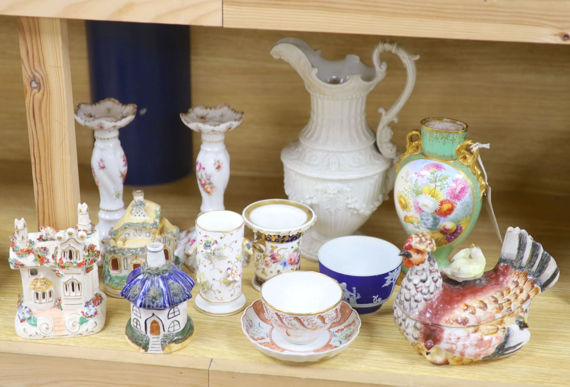 A group of mixed ceramics including a Copeland flower-painted vase, a Staffordshire hen and chick tureen and cover, Staffordshire cot